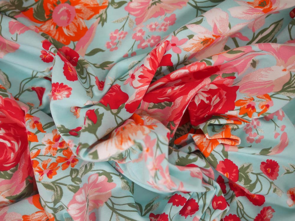 Single Jersey Printed Fabric - Pink Flowers on blue