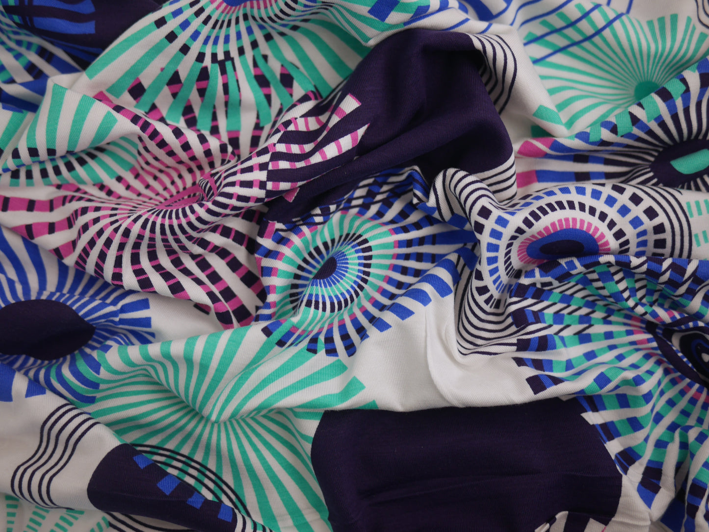 Printed Viscose Jersey Fabric - Colourful Wheels 0.70 Metre Remnant