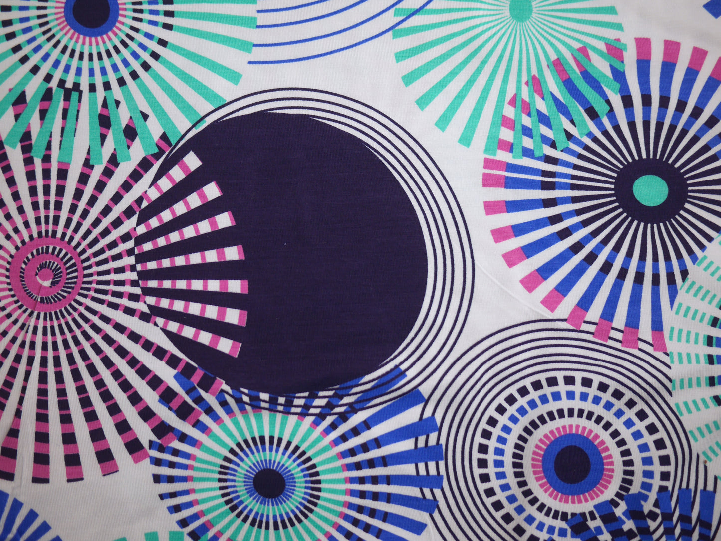 Printed Viscose Jersey Fabric - Colourful Wheels 0.70 Metre Remnant