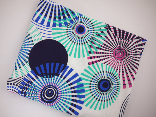 Printed Viscose Jersey Fabric - Colourful Wheels 0.70 Metre Remnant